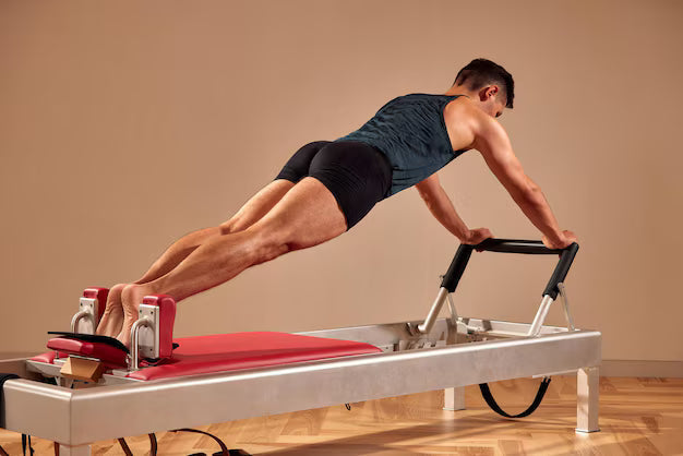 From the Gym to the Mat: How Pilates Enhances Men’s Strength Training