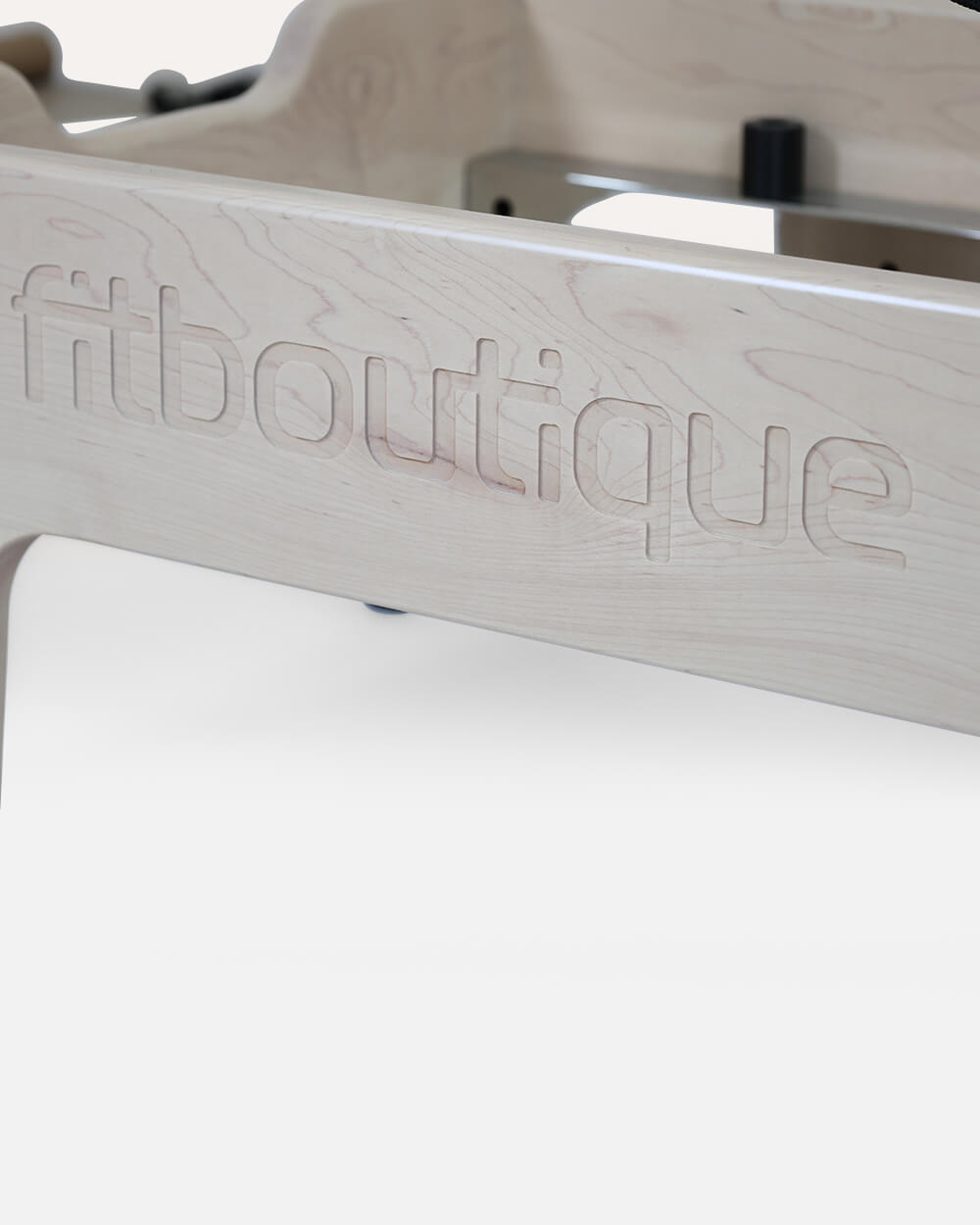 FitBoutique Logo Close Up View in Perlino Reformer